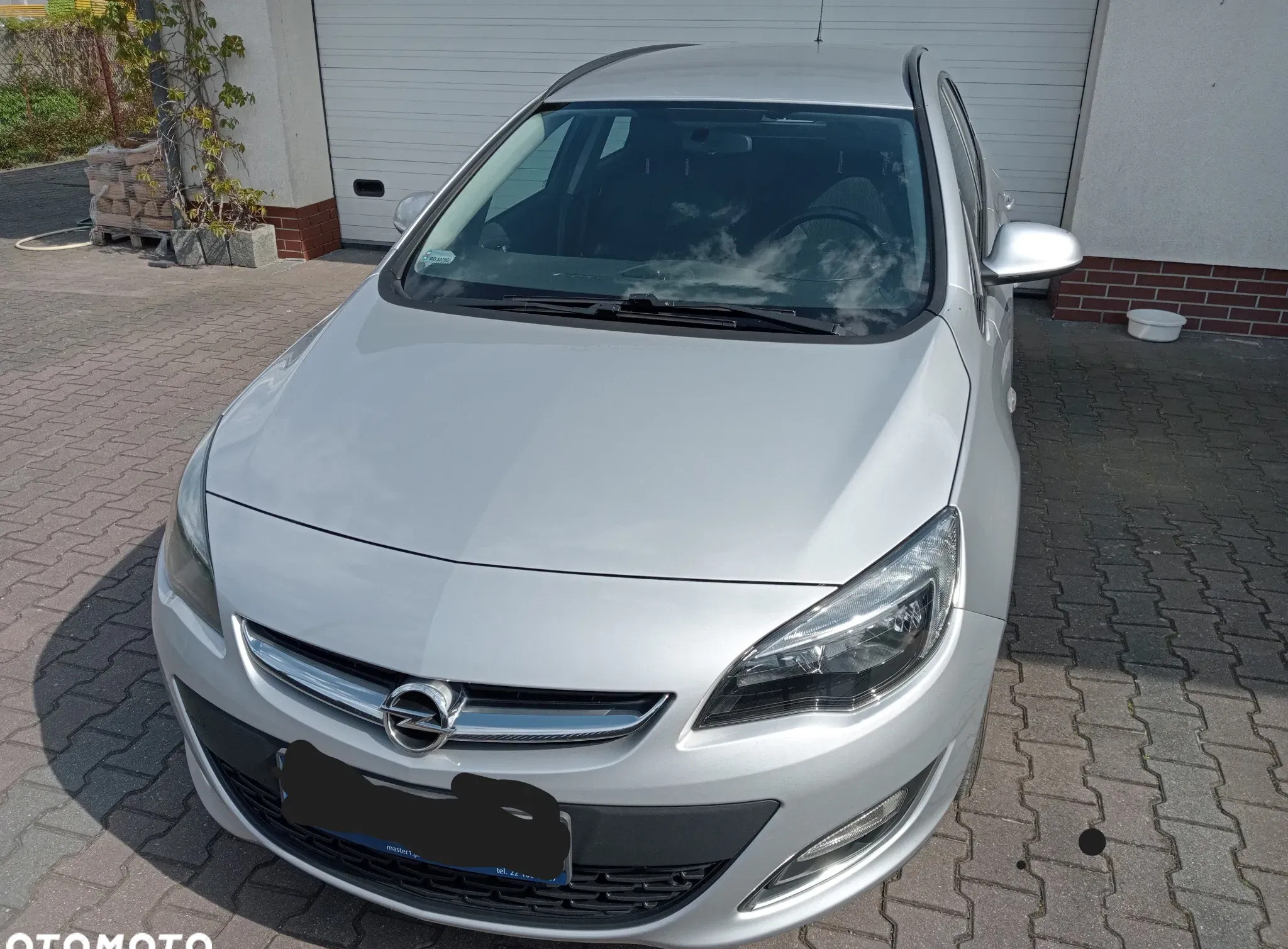 samochody osobowe Opel Astra cena 25900 przebieg: 216272, rok produkcji 2013 z Warszawa